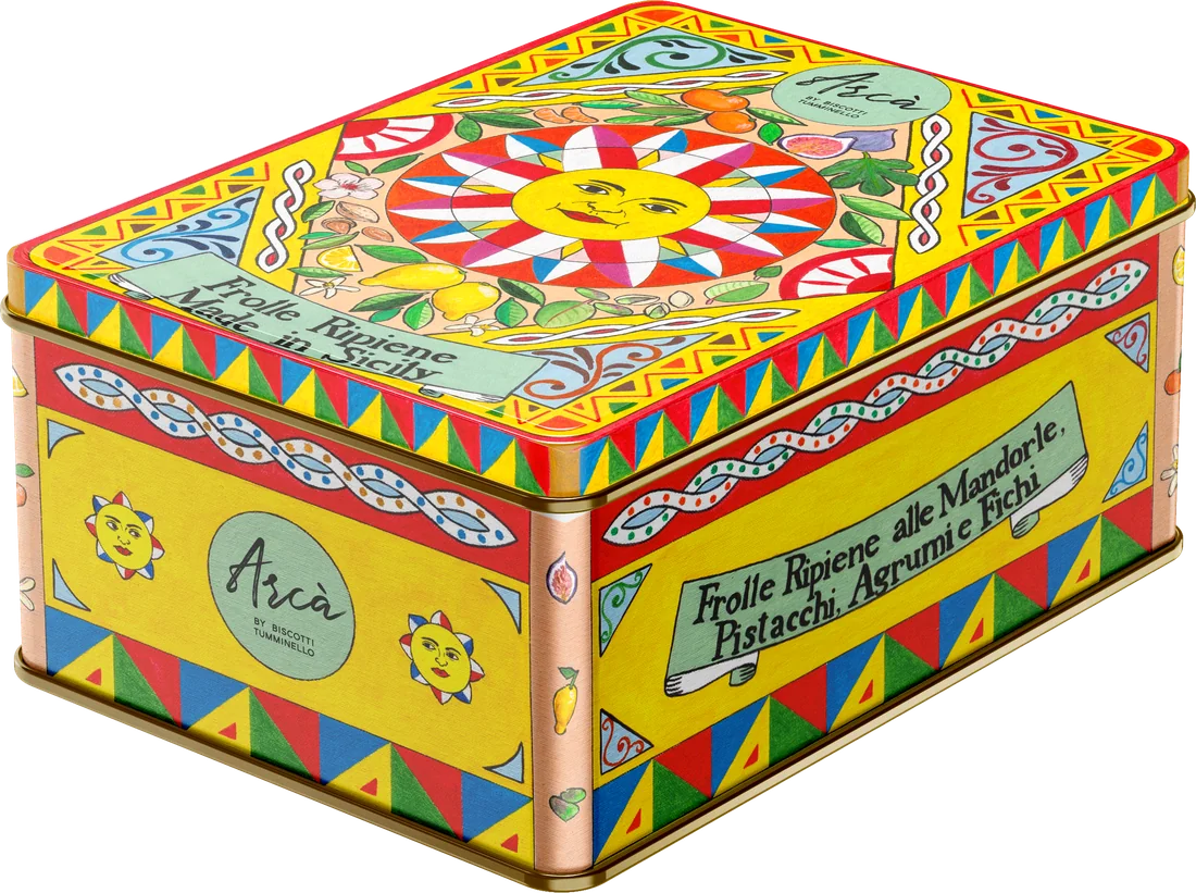 A yellow tin painted with folk patterns, a smiling sun on the lid