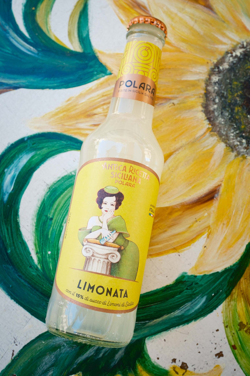 Polara — bottles and Sicilian citrus